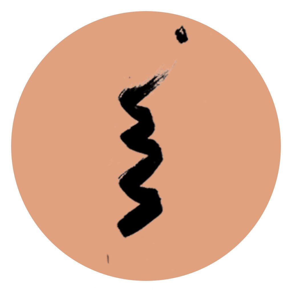 A symbol drawn with black paint hinting taking a journey north (following our north star of wellness)