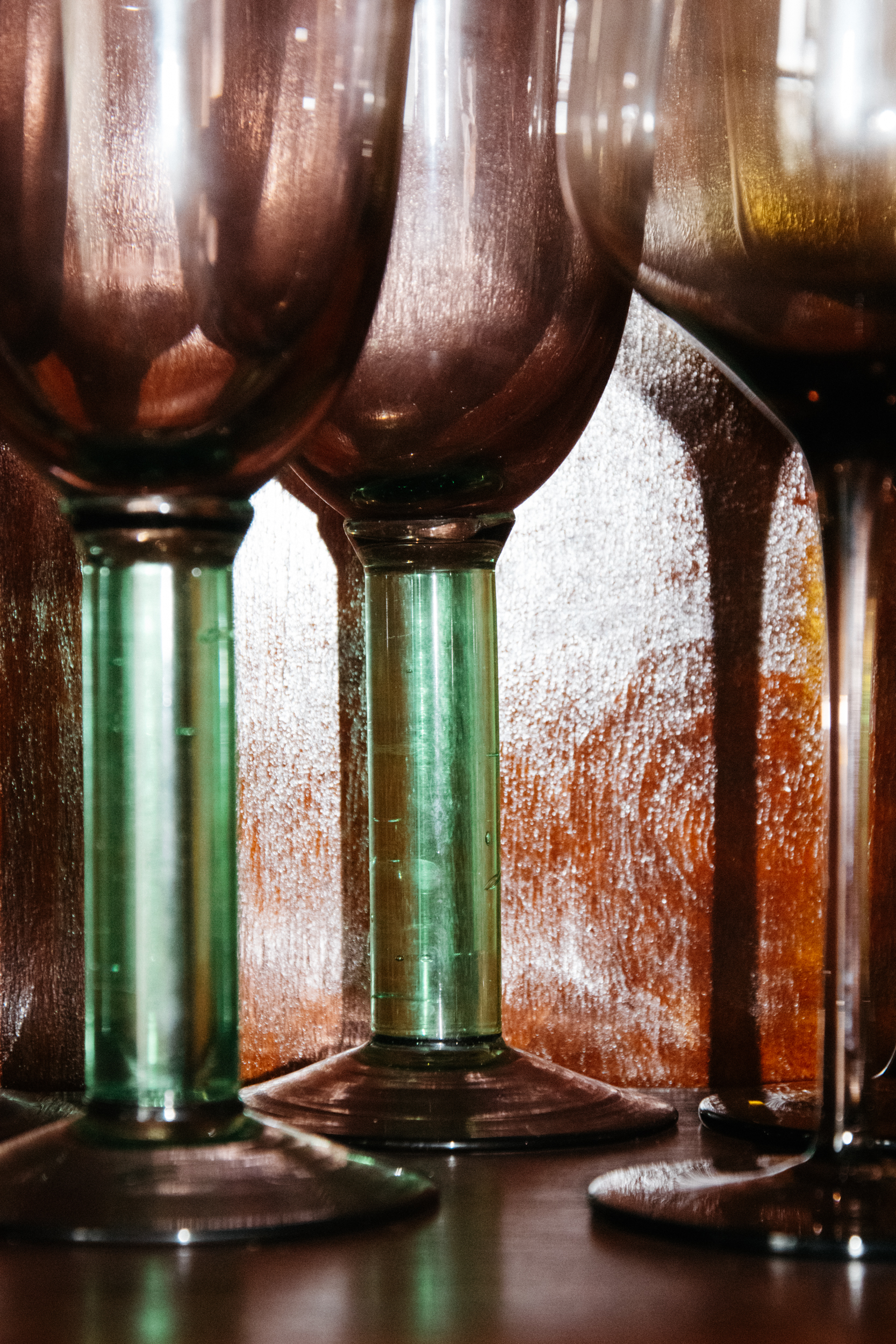 A close of of vintage colourful wine glasses