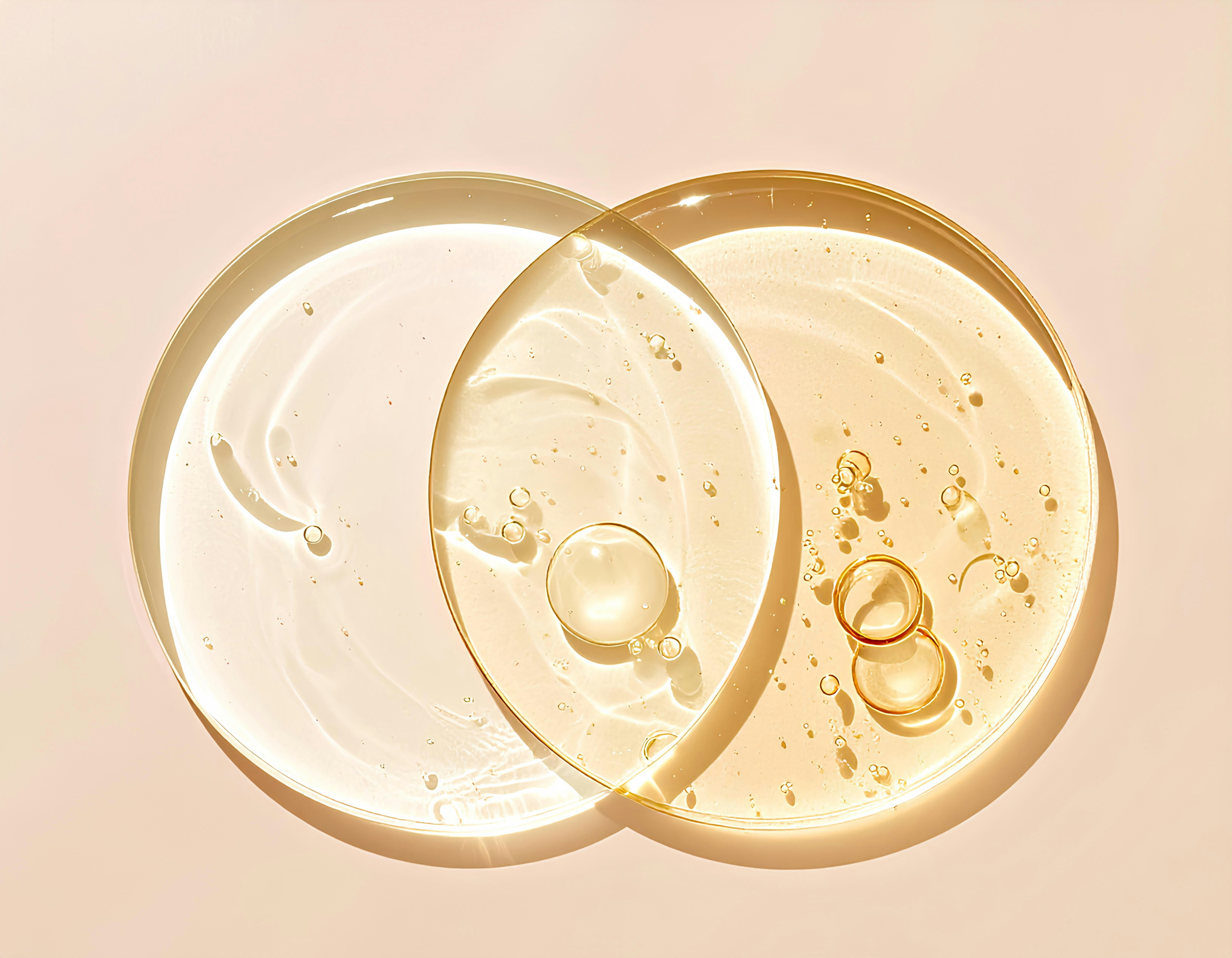 A still life image of two cleansers making a two circle pattern 